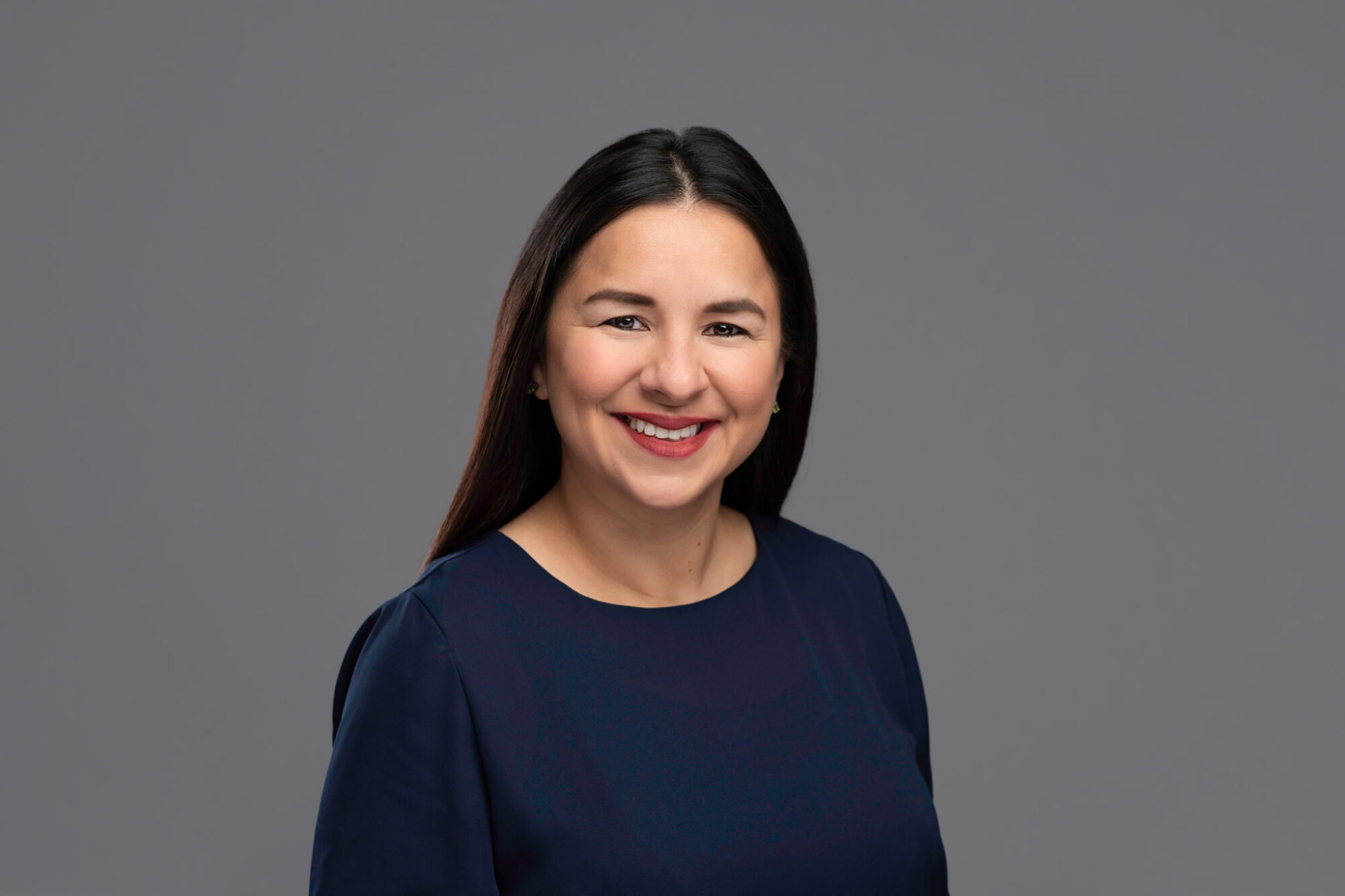 studio headshot of woman on gray background, Halifax Photographer